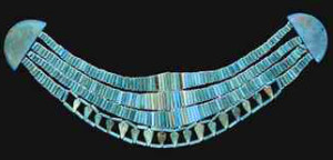 an_egyptian_turquoise_blue_glazed_composition_beaded_broad_collar_christies.com